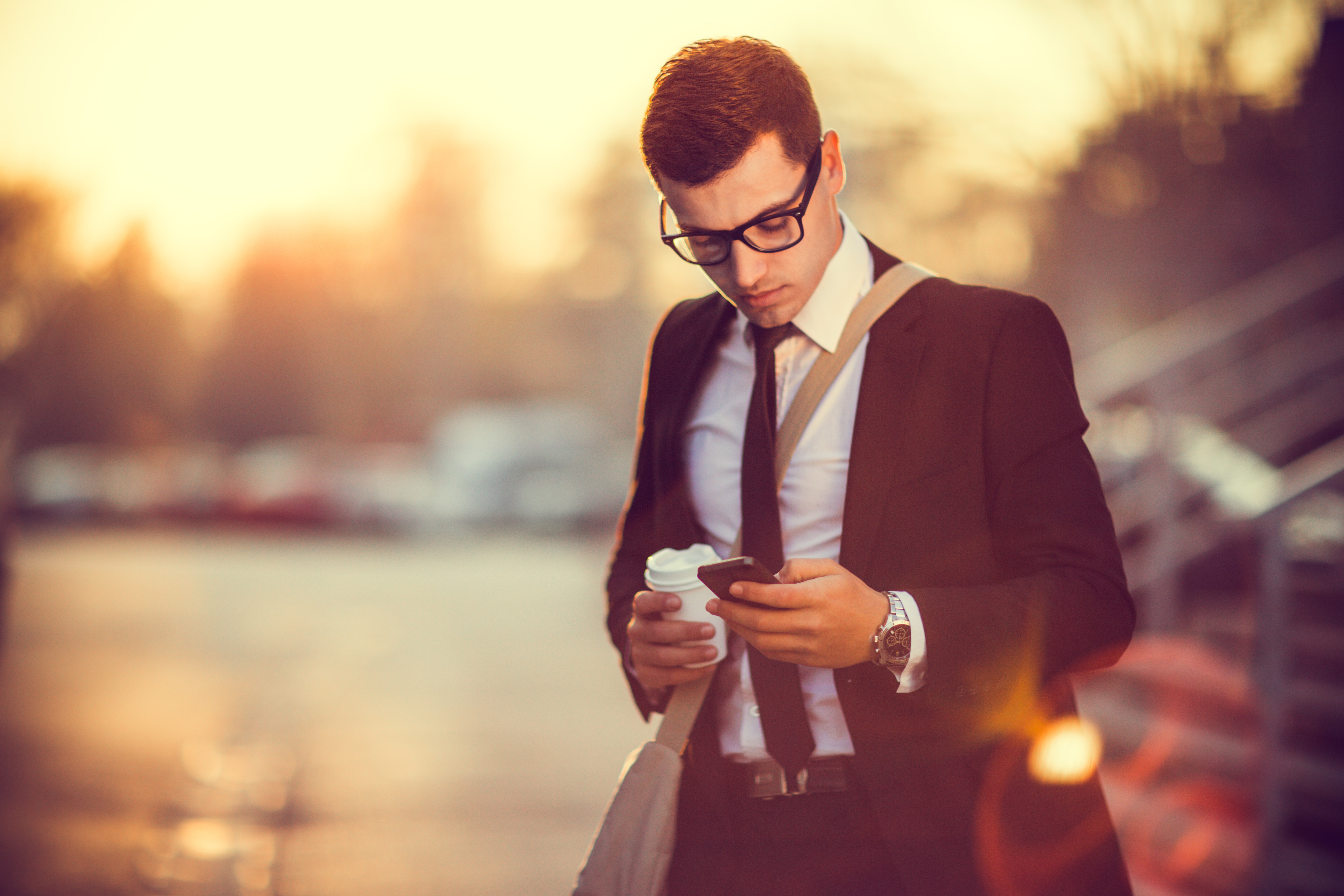 businessman holding an espresso