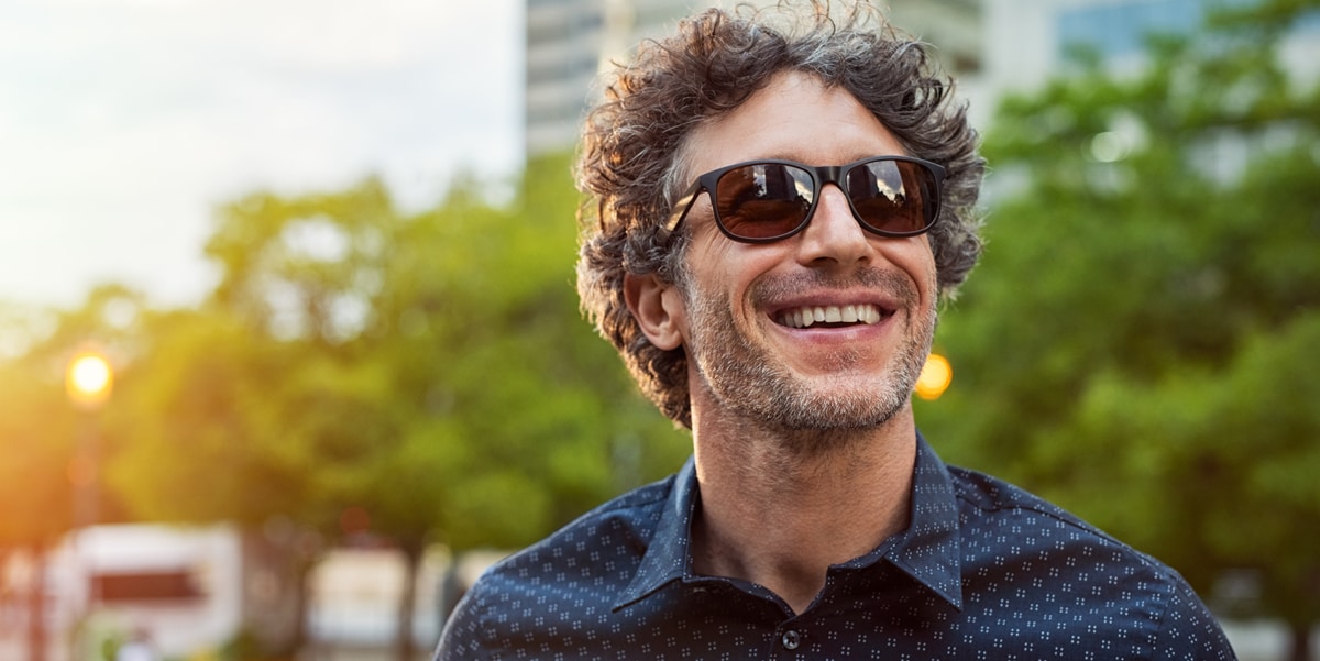 man outside in sunglasses